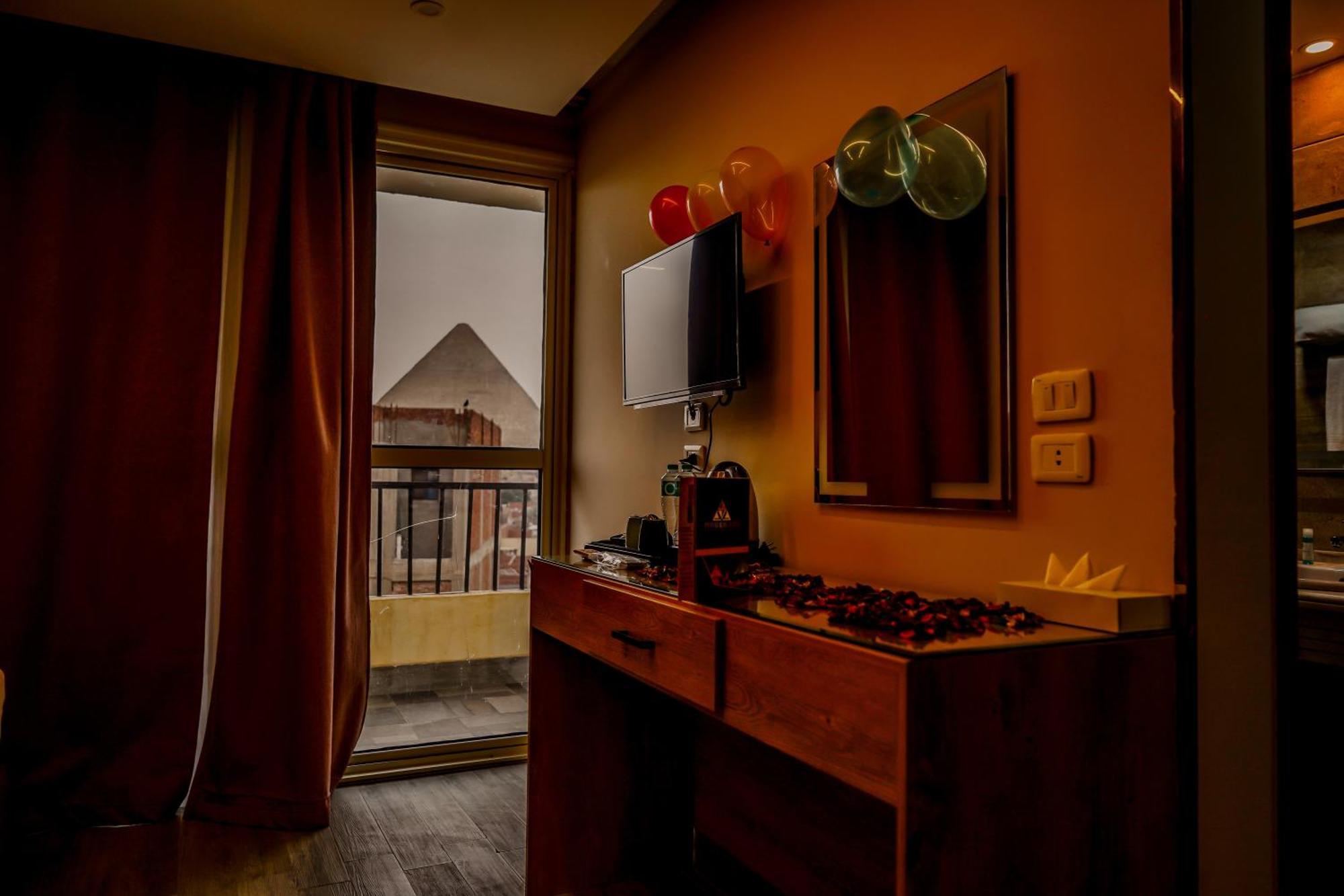Pyramids Hotel Kafret el-Gabal Екстериор снимка