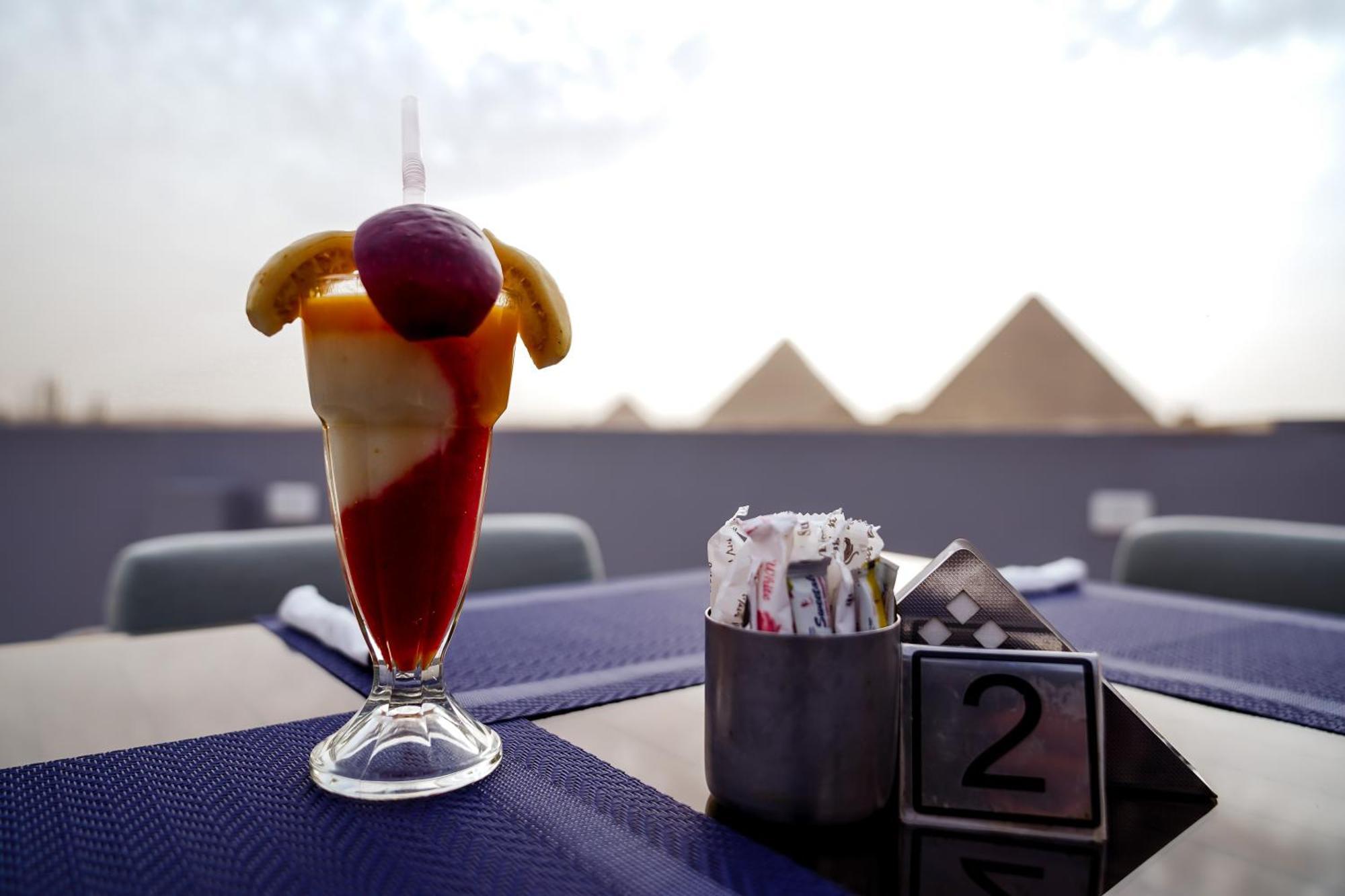 Pyramids Hotel Kafret el-Gabal Екстериор снимка